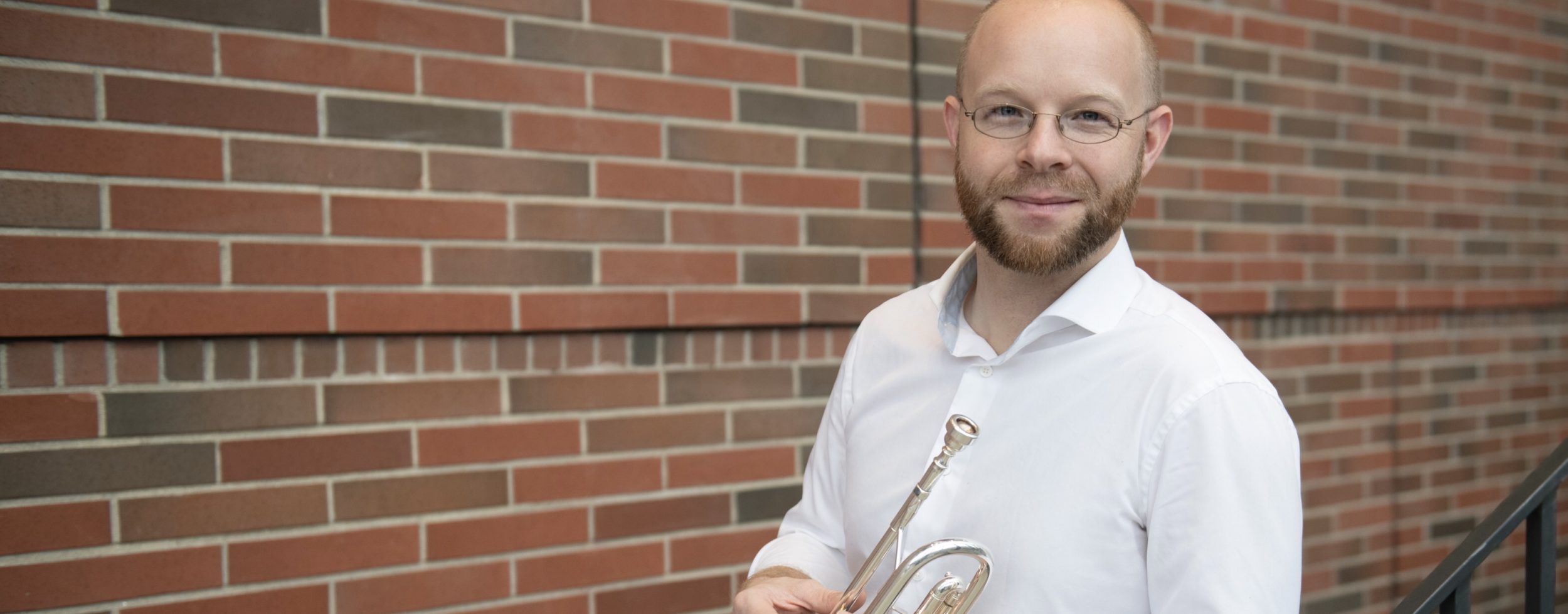Dr. Andrew Harms with trumpet